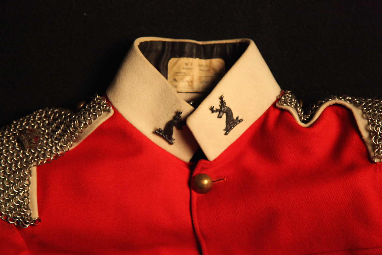 Detail from collar area of Hugh B. Brown's Canadian officer formal uniform