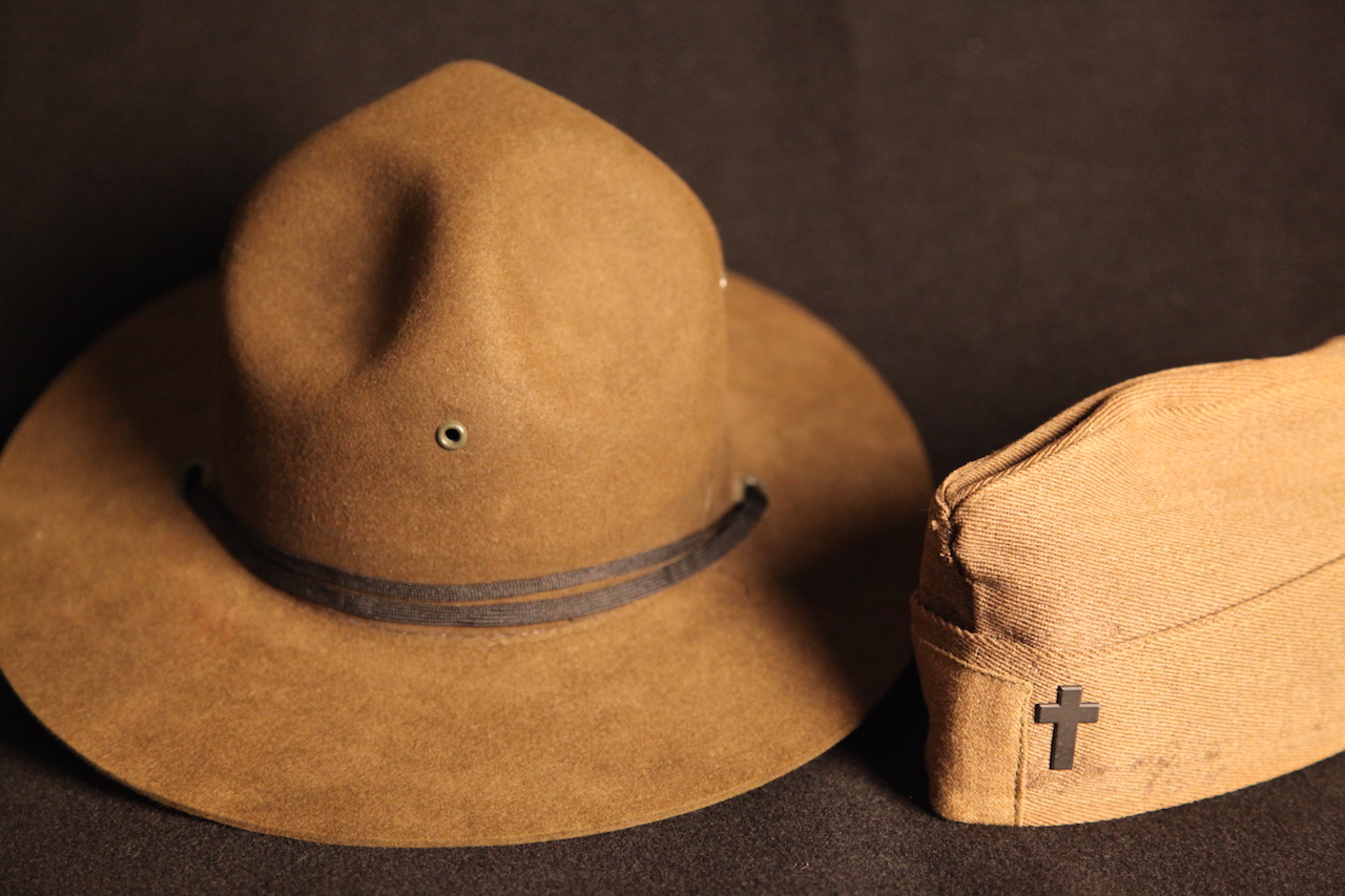 Two hats of World War I chaplain uniform